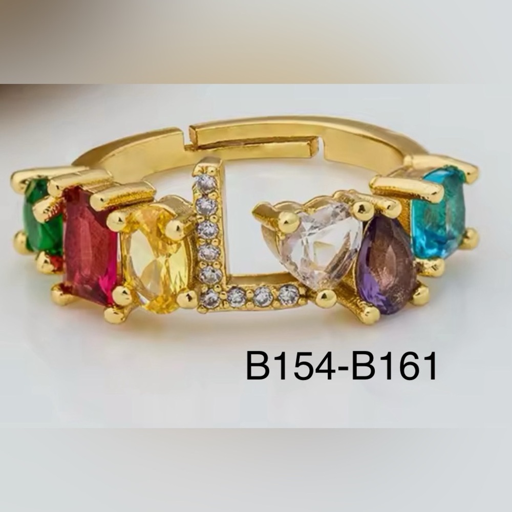 Personalized L initialed Ring with blue pink, green,purple stones around the L